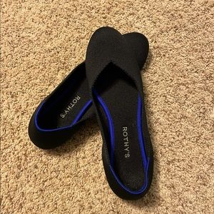 Rothy’s “The Flat” Black solid.
